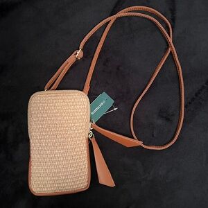 Woven straw and leather phone clutch